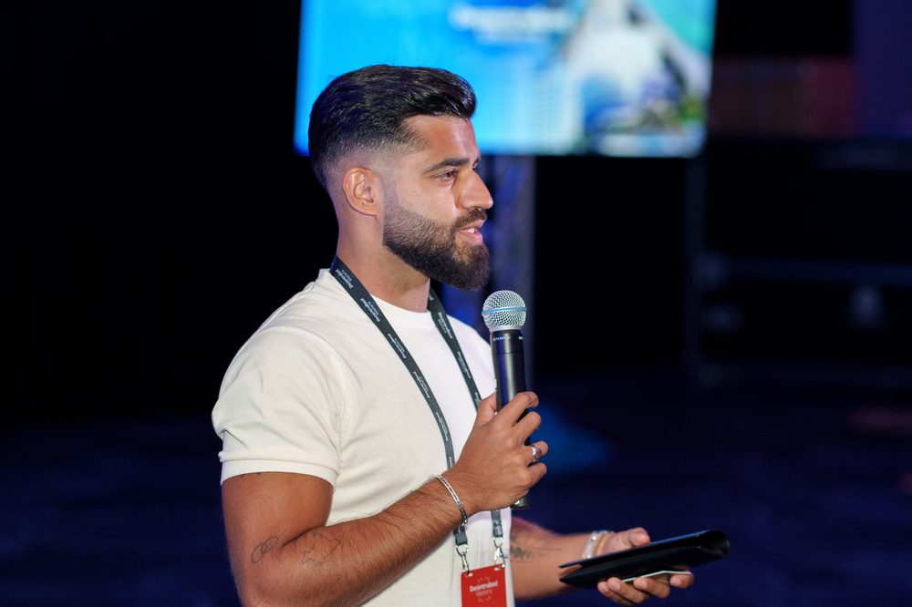 Tan Gera, CFA, Co-Founder of Decentralized Masters, speaking at a Decentralized Masters event